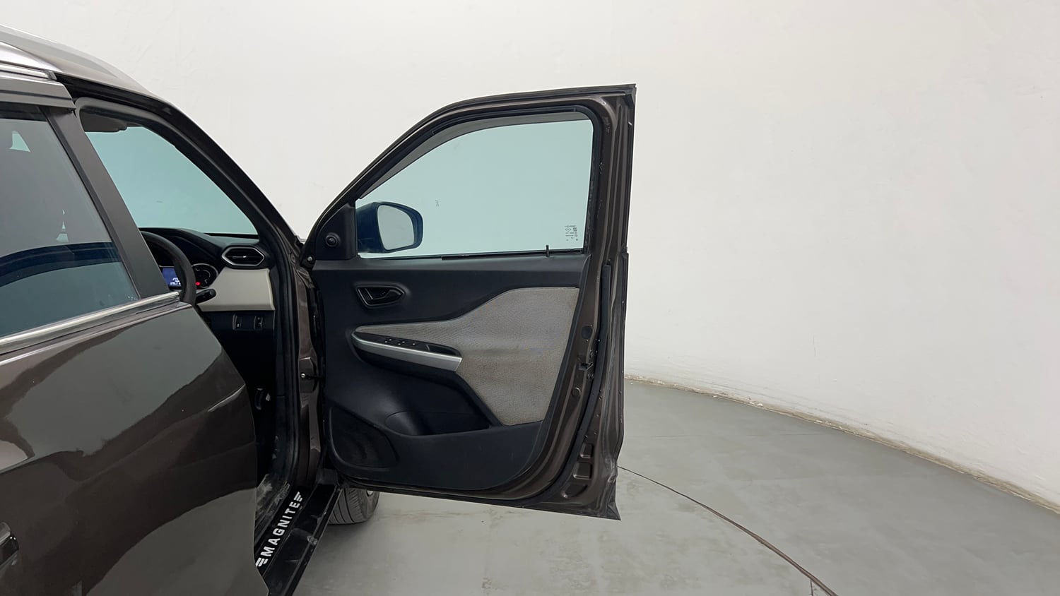 Used 2023 Nissan Magnite XE Petrol Manual interior RIGHT FRONT DOOR OPEN VIEW