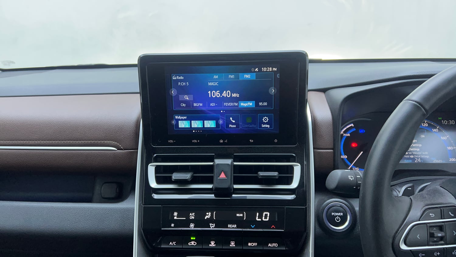 Used 2023 Toyota Innova Hycross VX Hybrid 7 STR Hybrid Automatic interior MUSIC SYSTEM & AC CONTROL VIEW