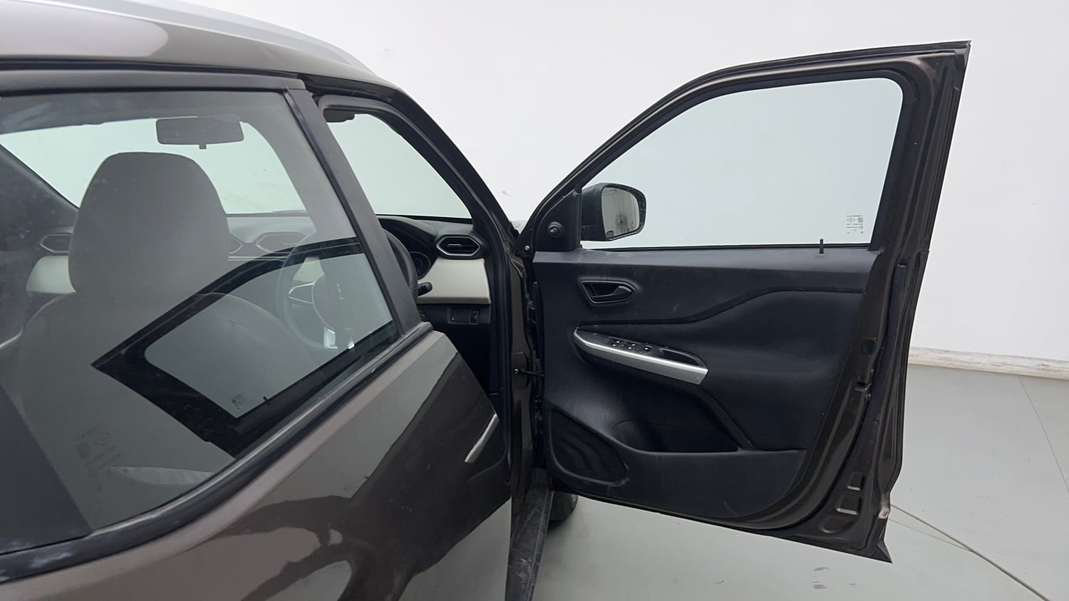 Used 2023 Nissan Magnite XE Petrol Manual interior RIGHT FRONT DOOR OPEN VIEW
