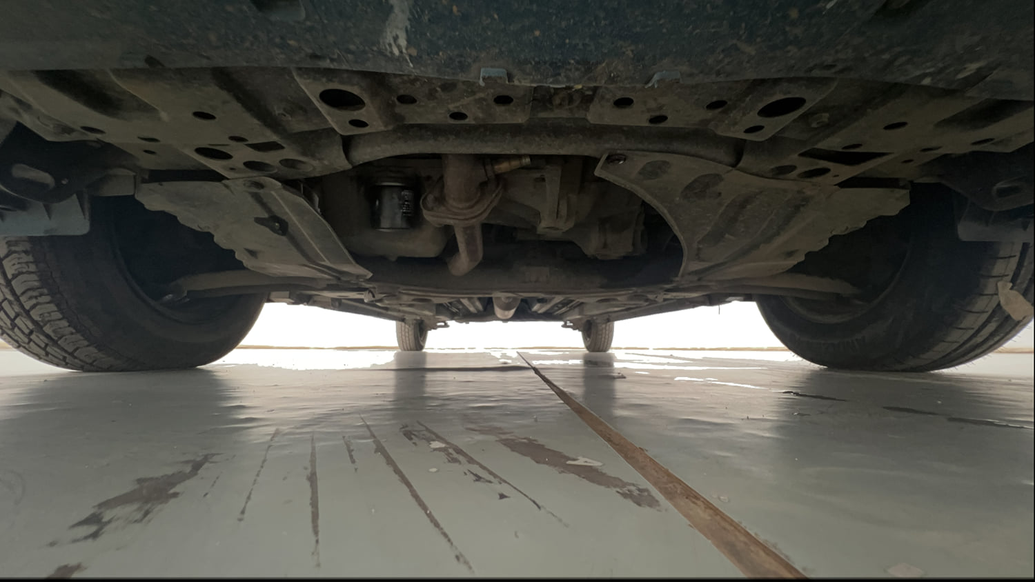 Used 2013 Maruti Suzuki Swift Dzire VXI Petrol Manual extra FRONT LEFT UNDERBODY VIEW