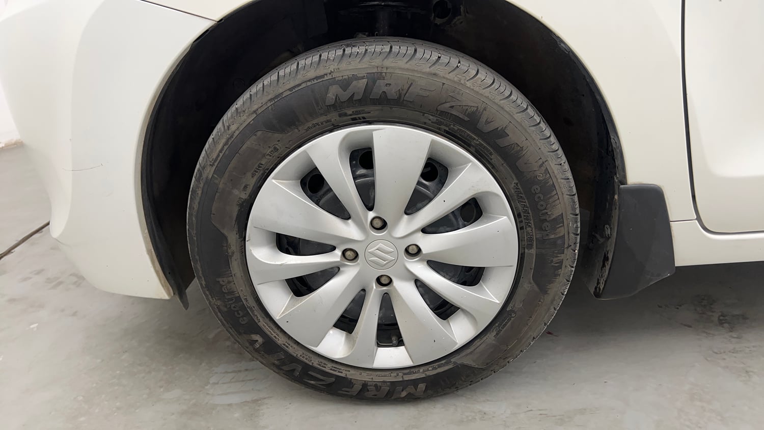 Used 2016 Maruti Suzuki Baleno Delta Petrol+CNG (Outside Fitted) Cng Manual tyres LEFT FRONT TYRE RIM VIEW