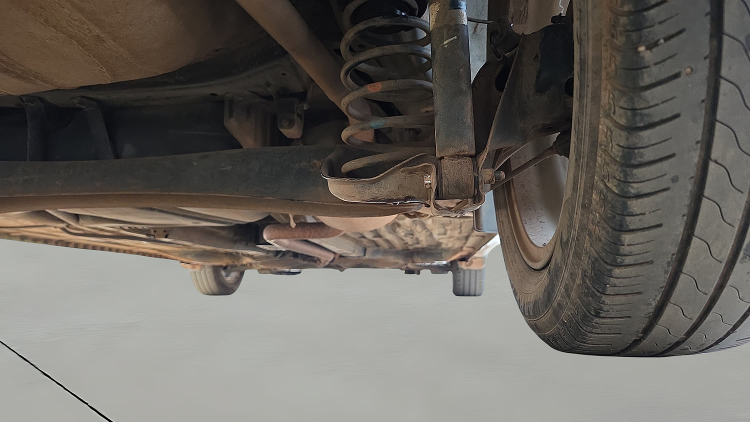 Used 2019 Honda Amaze 1.2 V CVT Petrol Petrol Automatic extra REAR RIGHT UNDERBODY VIEW