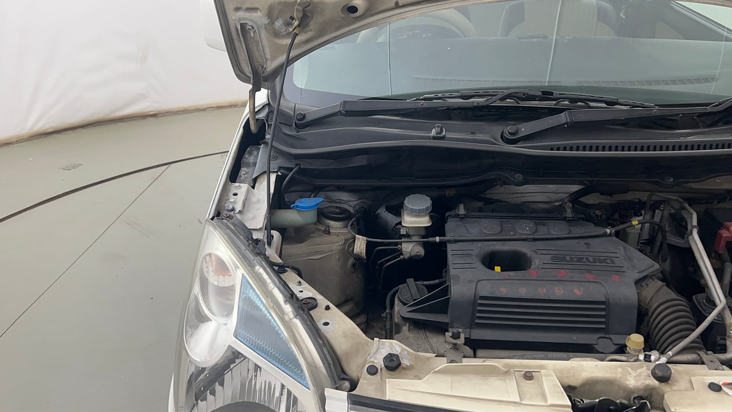 Used 2014 Maruti Suzuki Wagon R VXI Petrol Manual engine ENGINE RIGHT SIDE HINGE & APRON VIEW