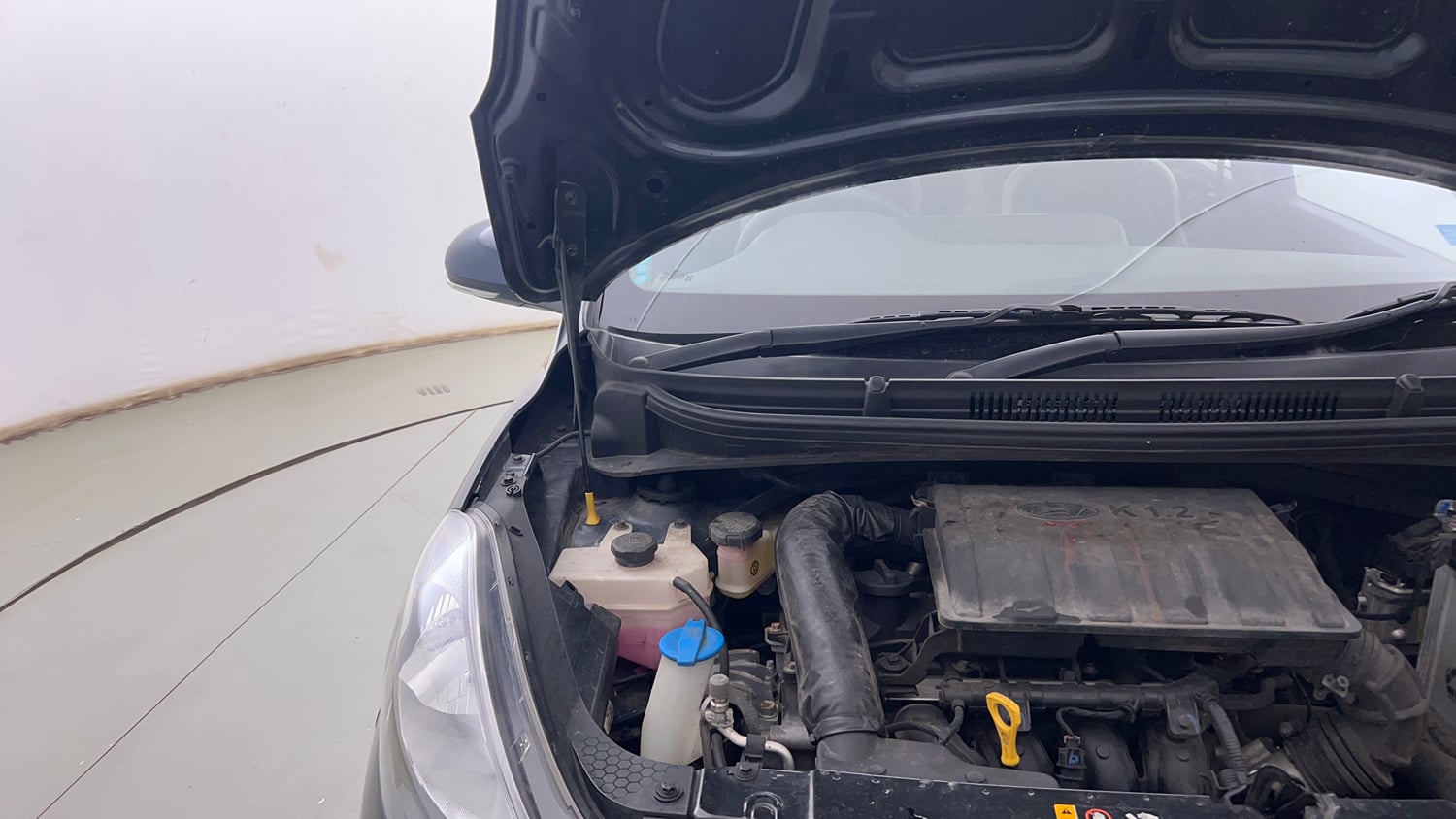 Used 2022 Hyundai Grand i10 Nios Sportz 1.2 Kappa VTVT Petrol Manual engine ENGINE RIGHT SIDE HINGE & APRON VIEW