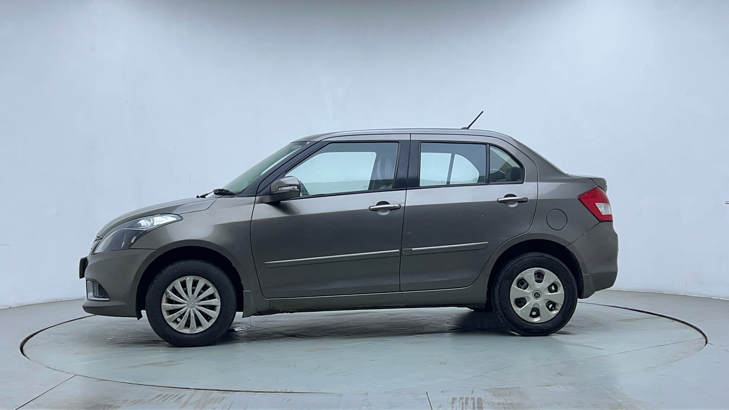 Used 2015 Maruti Suzuki Swift Dzire VXI Petrol Manual exterior LEFT SIDE VIEW