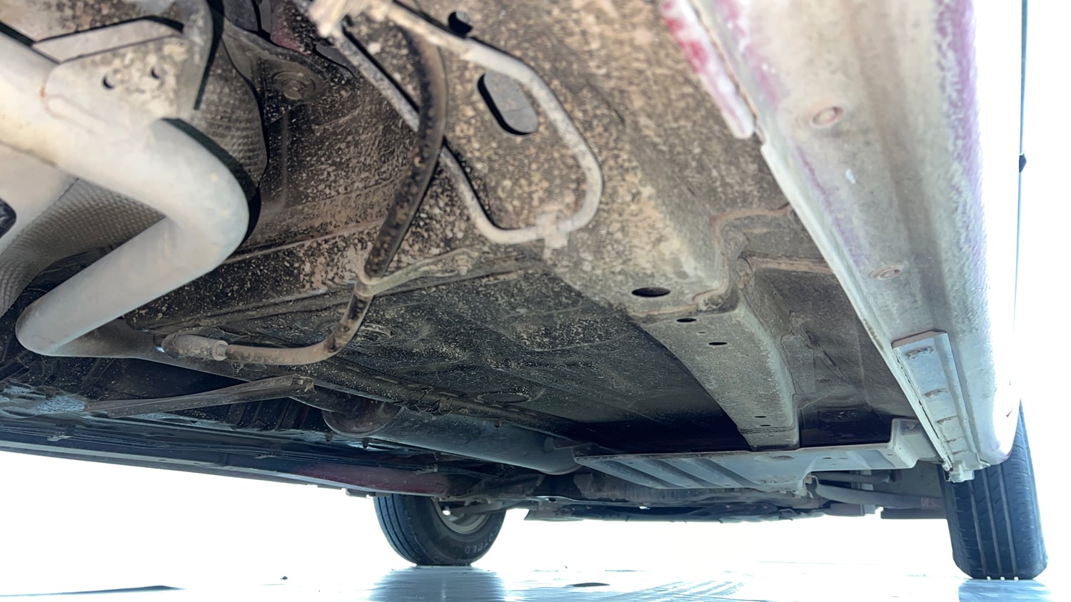 Used 2024 Maruti Suzuki Swift VXi (O) AMT Petrol Automatic extra REAR RIGHT UNDERBODY VIEW