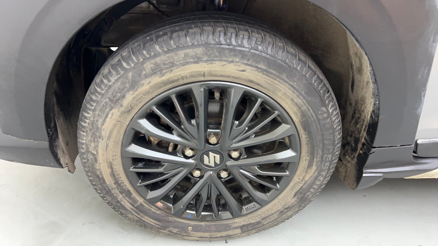 Used 2021 Maruti Suzuki XL6 Zeta MT Petrol Petrol Manual tyres LEFT FRONT TYRE RIM VIEW