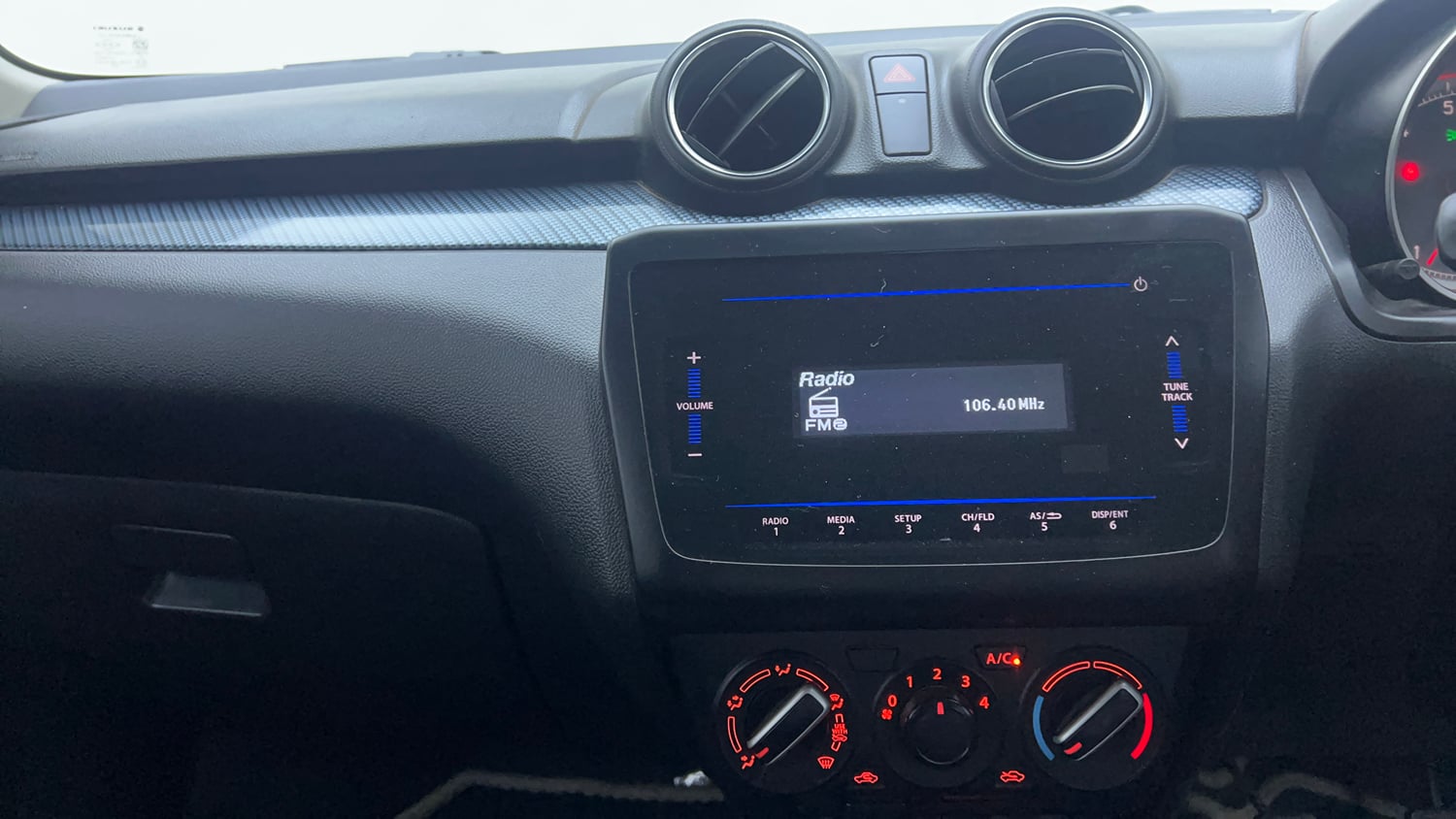 Used 2022 Maruti Suzuki Swift VXi Petrol Manual interior MUSIC SYSTEM & AC CONTROL VIEW