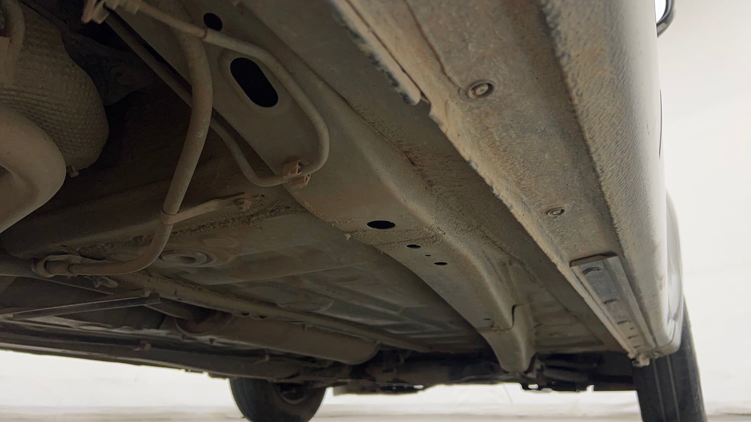 Used 2018 Maruti Suzuki Dzire VXi AMT Petrol Automatic extra REAR RIGHT UNDERBODY VIEW