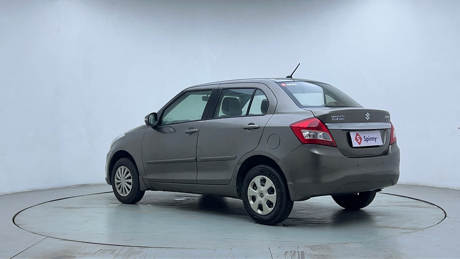 Used 2015 Maruti Suzuki Swift Dzire VXI Petrol Manual exterior LEFT REAR CORNER VIEW