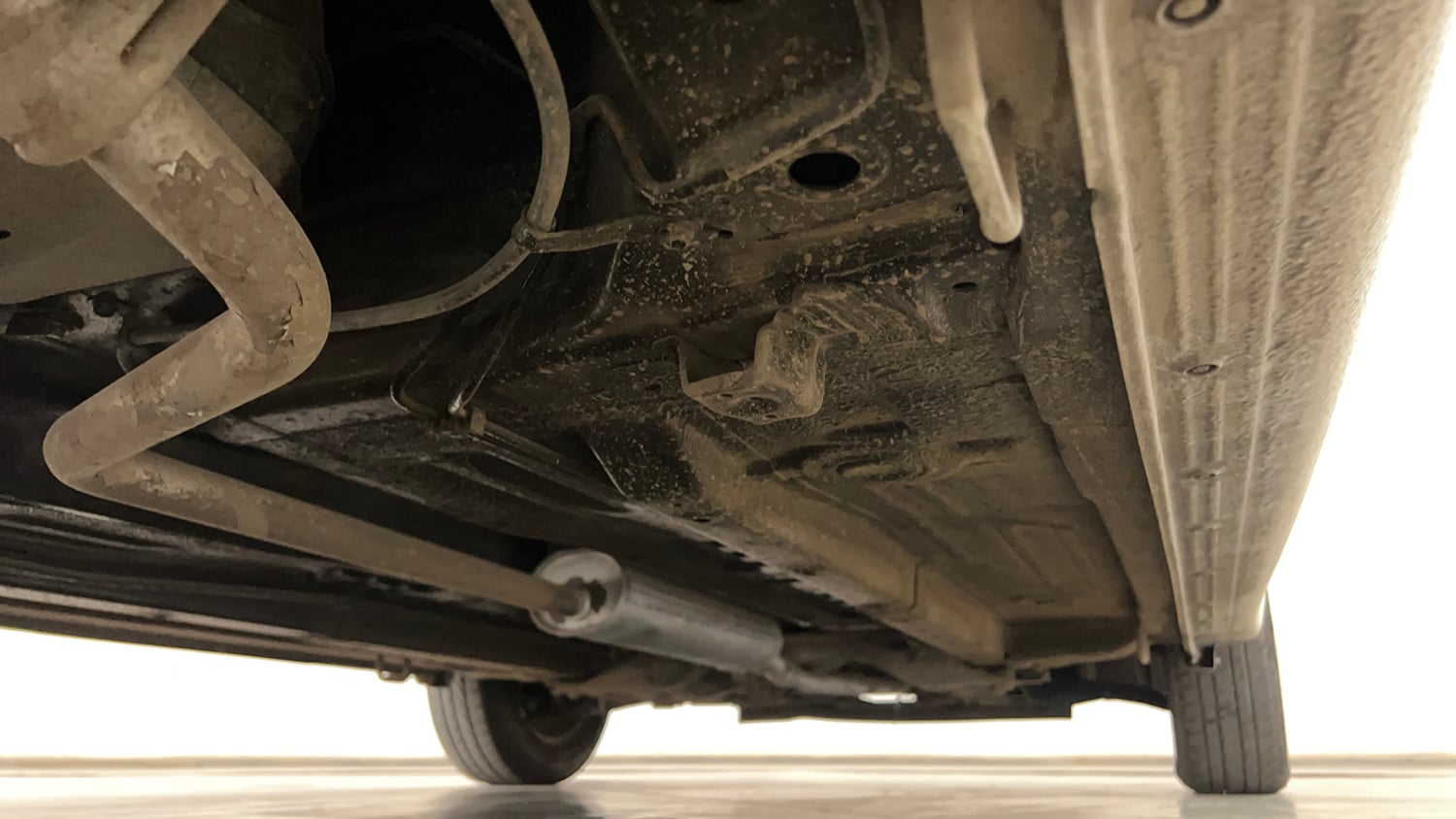 Used 2015 Maruti Suzuki Celerio VXi AMT Petrol Automatic extra REAR RIGHT UNDERBODY VIEW