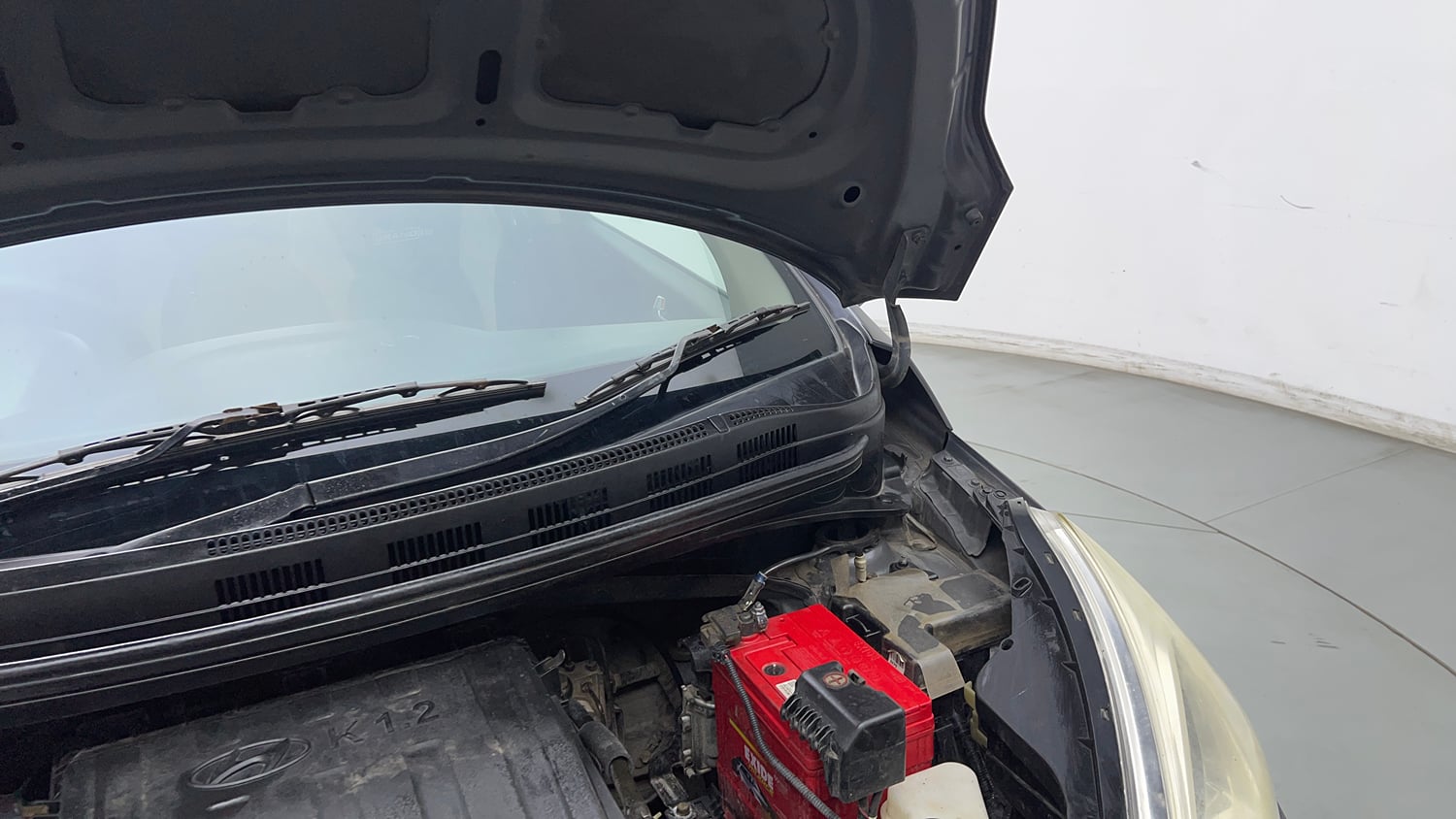 Used 2018 Hyundai Grand i10 Sportz 1.2 Kappa VTVT Petrol Manual engine ENGINE LEFT SIDE HINGE & APRON VIEW