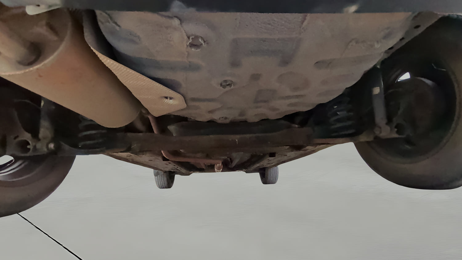 Used 2023 Nissan Magnite XL Petrol Manual extra REAR RIGHT UNDERBODY VIEW