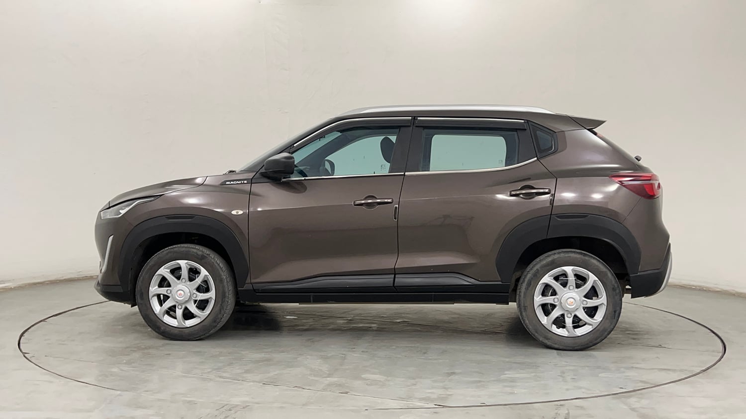 Used 2023 Nissan Magnite XE Petrol Manual exterior LEFT SIDE VIEW