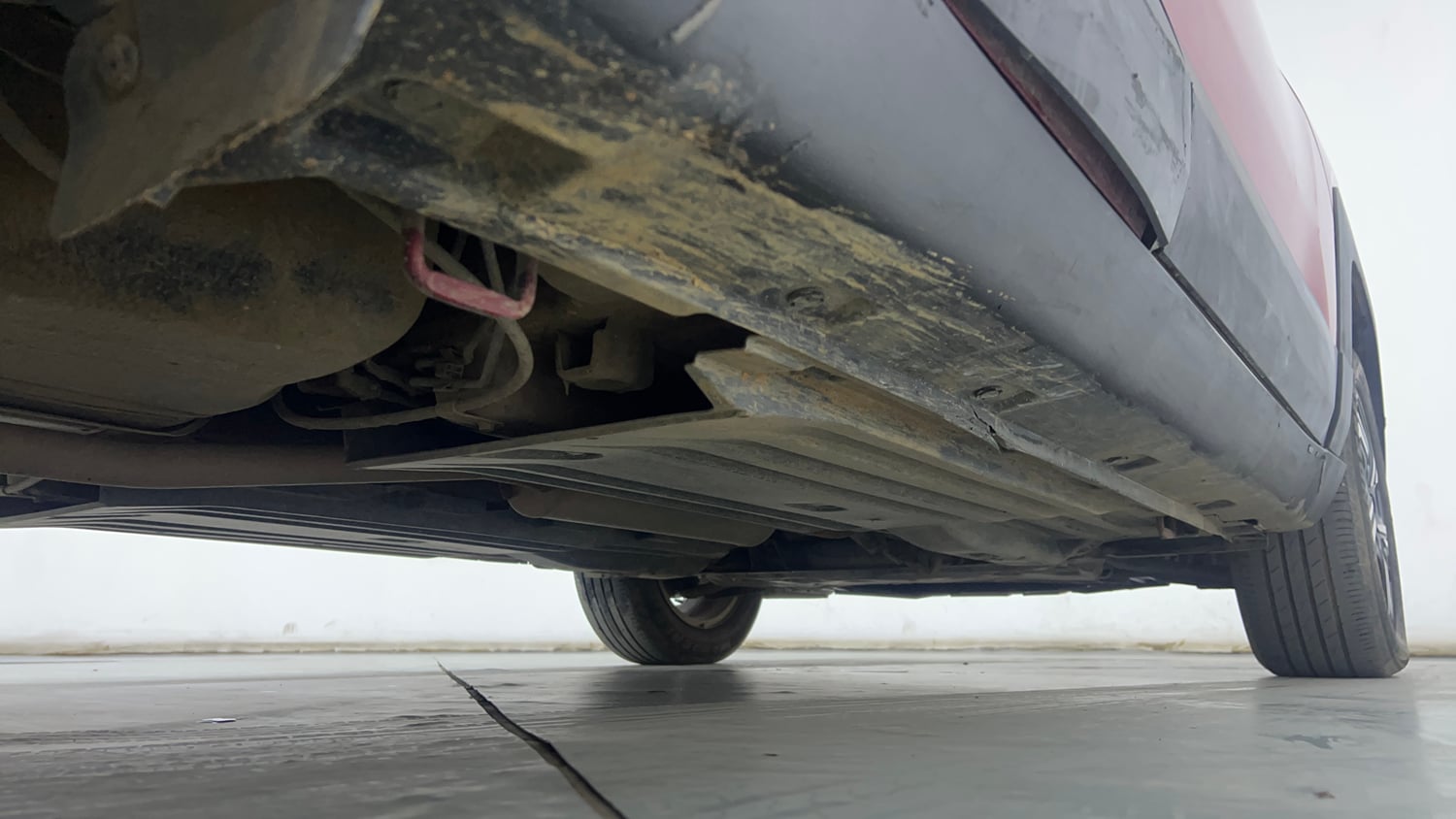 Used 2023 Maruti Suzuki Brezza Zxi Plus Dual Tone Petrol Manual extra REAR RIGHT UNDERBODY VIEW