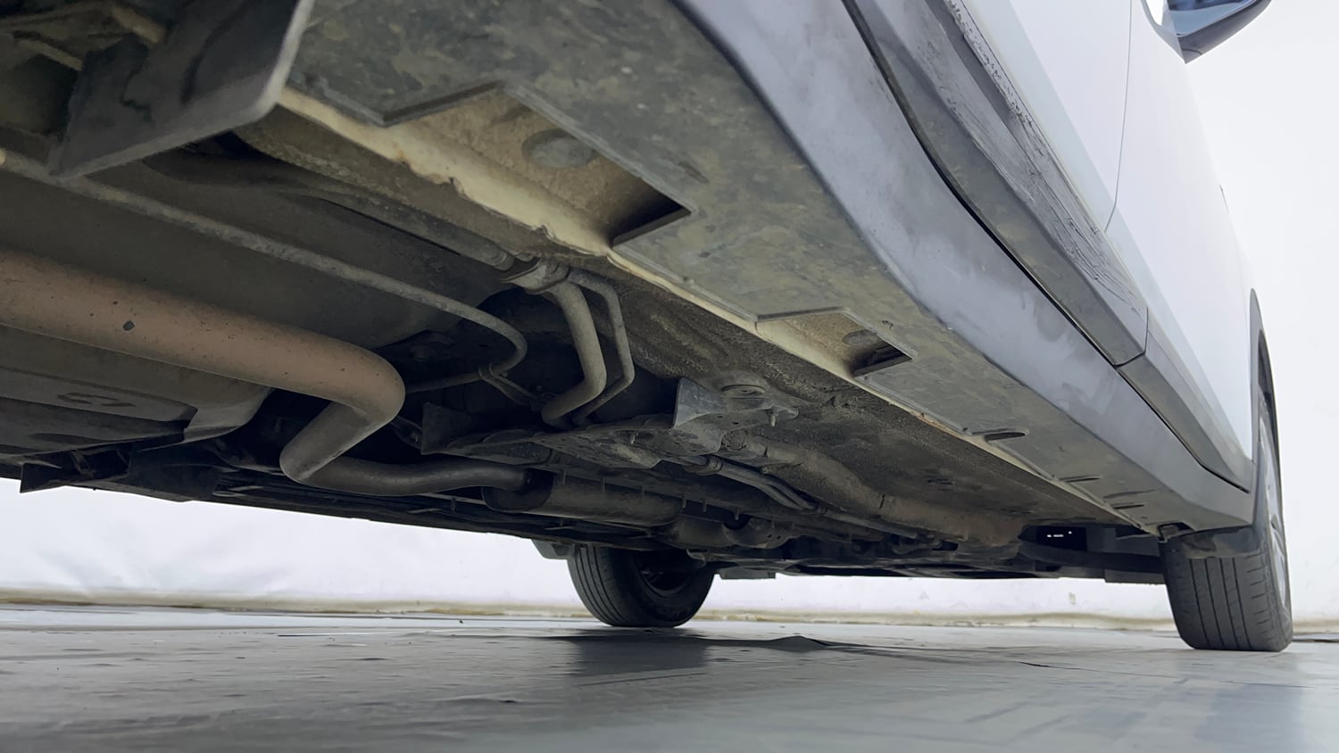 Used 2023 Kia Carens Prestige 1.5 Petrol 7 STR Petrol Manual extra REAR RIGHT UNDERBODY VIEW