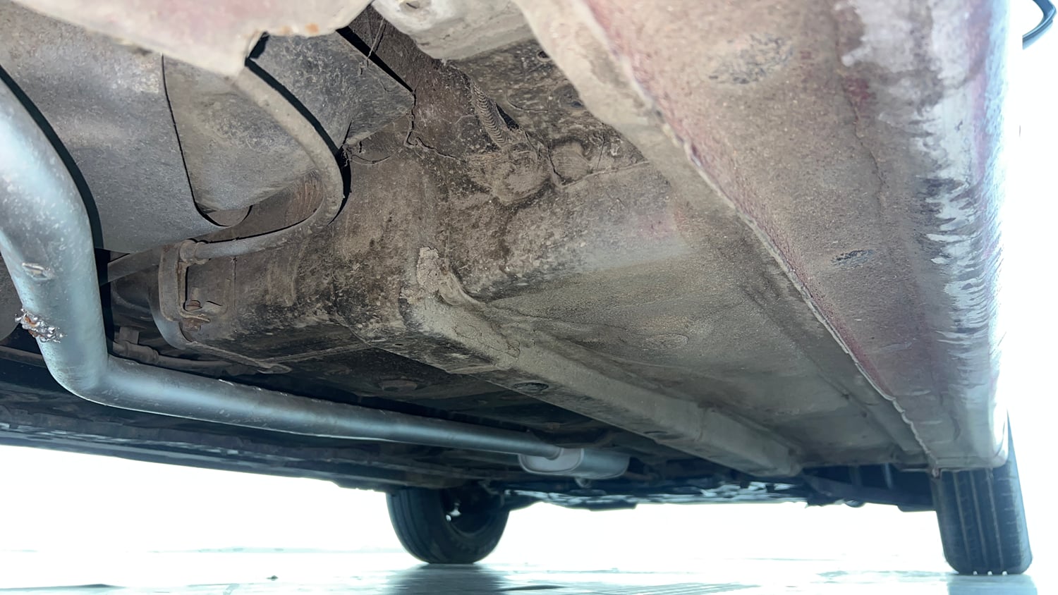 Used 2013 Hyundai Grand i10 Sportz 1.2 Kappa VTVT Petrol Manual extra REAR RIGHT UNDERBODY VIEW