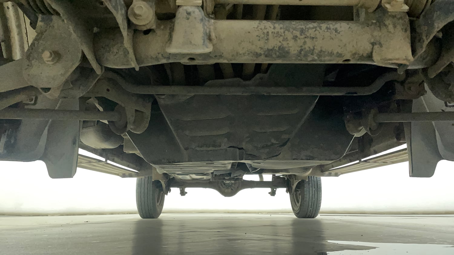 Used 2013 Maruti Suzuki Eeco 5 STR WITH A/C+HTR Petrol Manual extra FRONT LEFT UNDERBODY VIEW