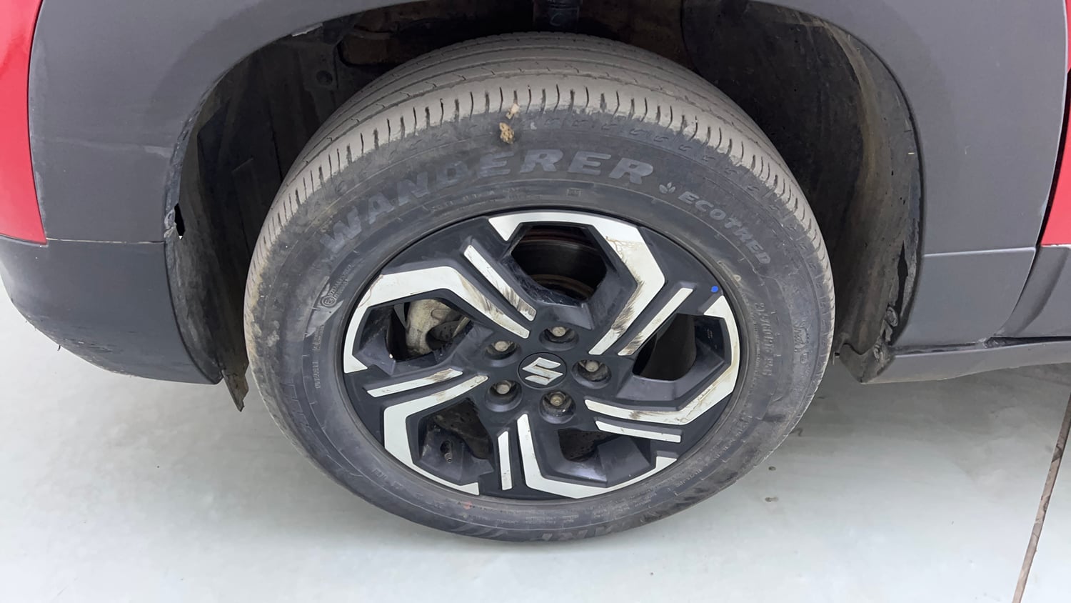 Used 2023 Maruti Suzuki Brezza Zxi Plus Dual Tone Petrol Manual tyres LEFT FRONT TYRE RIM VIEW
