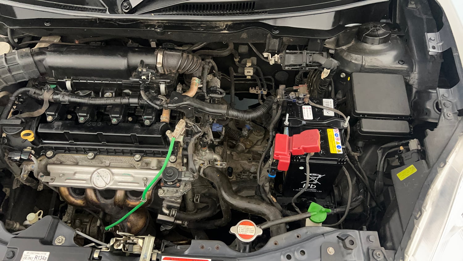 Used 2022 Maruti Suzuki Swift VXi Petrol Manual engine ENGINE LEFT SIDE VIEW
