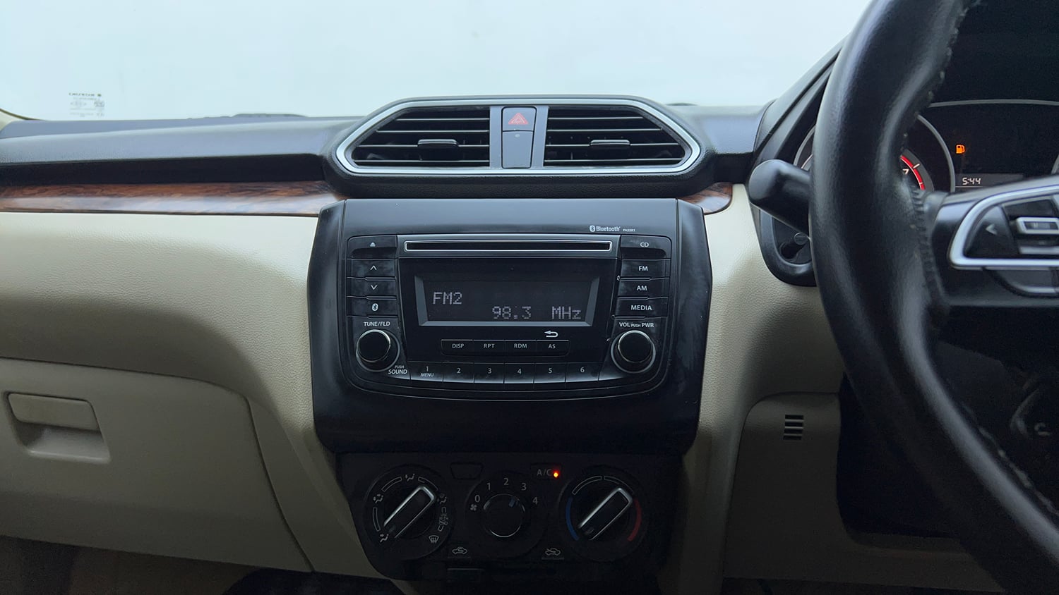 Used 2018 Maruti Suzuki Dzire VXi Petrol Manual top_features Integrated (in-dash) music system