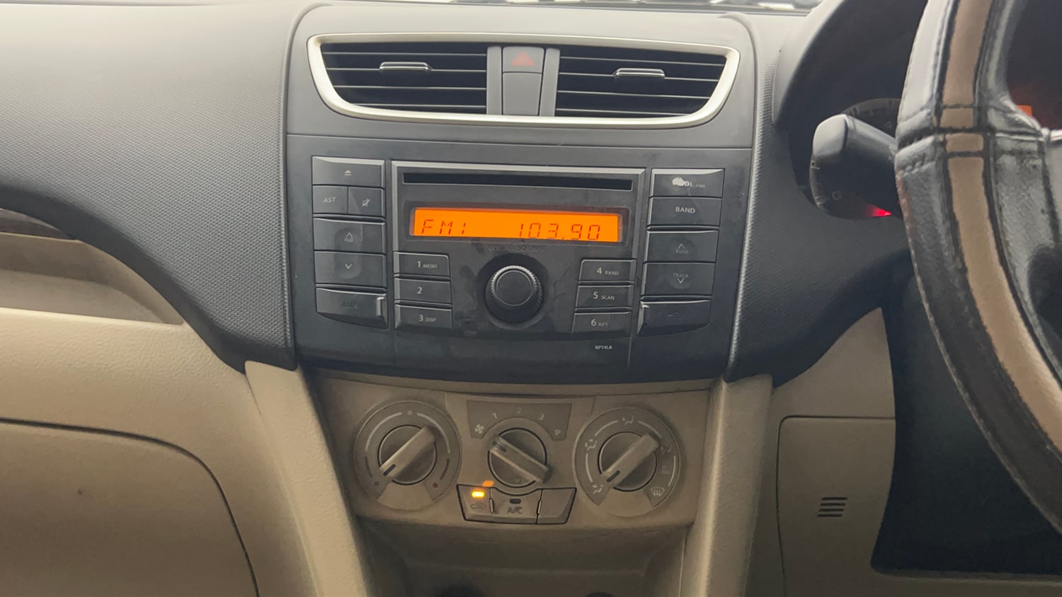 Used 2013 Maruti Suzuki Swift Dzire VXI Petrol Manual top_features Integrated (in-dash) music system