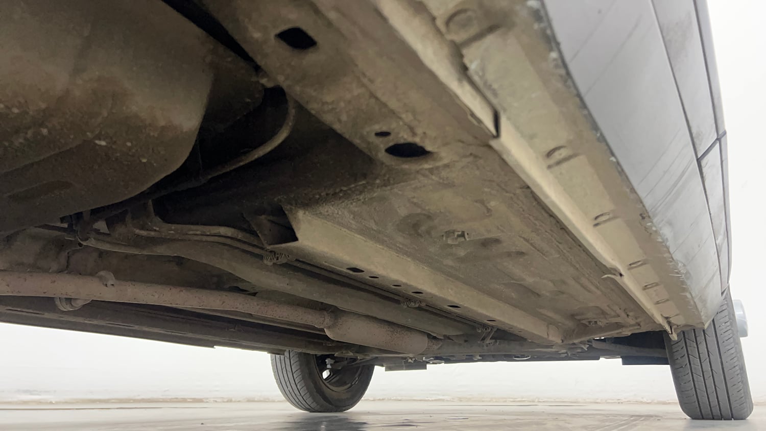 Used 2023 Nissan Magnite XE Petrol Manual extra REAR RIGHT UNDERBODY VIEW