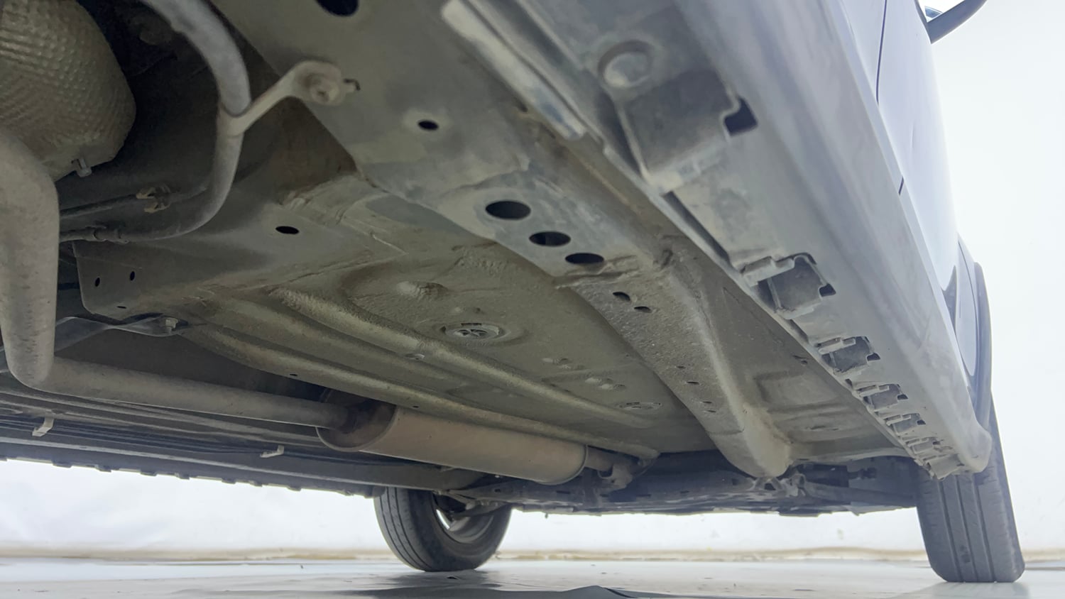 Used 2023 Maruti Suzuki Ignis Zeta 1.2 AMT Petrol Automatic extra REAR RIGHT UNDERBODY VIEW