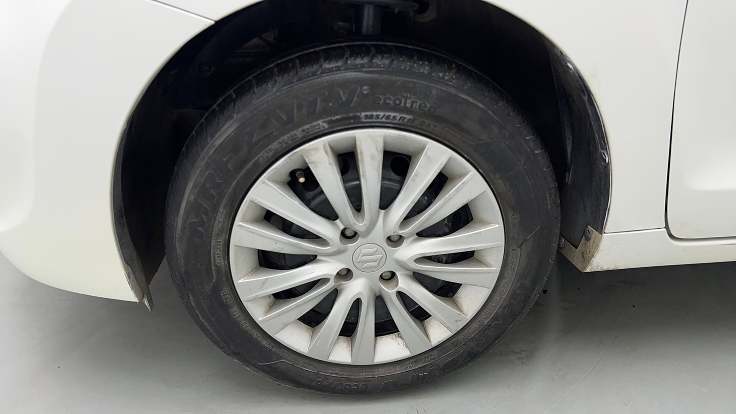 Used 2021 Maruti Suzuki Baleno Delta Petrol Manual tyres LEFT FRONT TYRE RIM VIEW