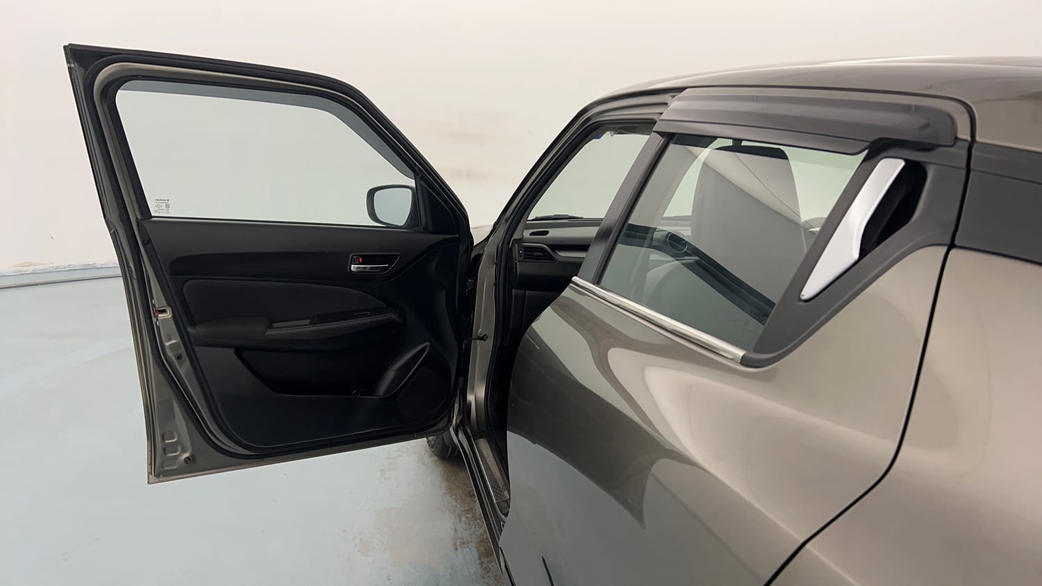 Used 2022 Maruti Suzuki Swift VXi Petrol Manual interior LEFT FRONT DOOR OPEN VIEW
