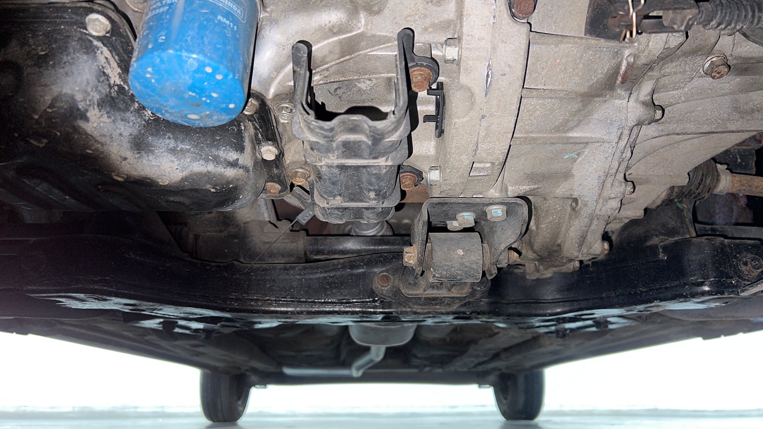 Used 2013 Hyundai Grand i10 Sportz 1.2 Kappa VTVT Petrol Manual extra FRONT LEFT UNDERBODY VIEW