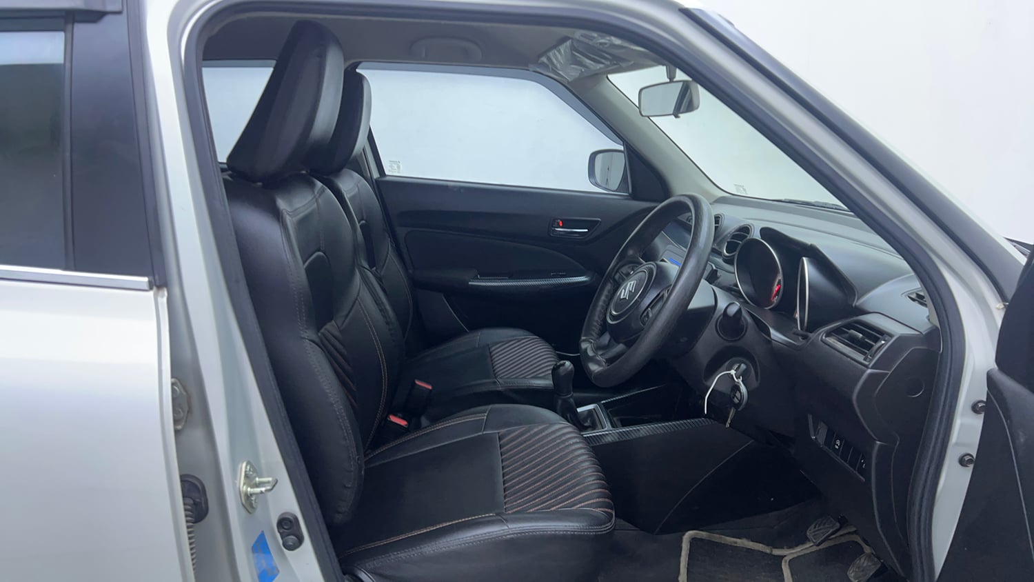 Used 2022 Maruti Suzuki Swift VXi Petrol Manual interior RIGHT SIDE FRONT DOOR CABIN VIEW
