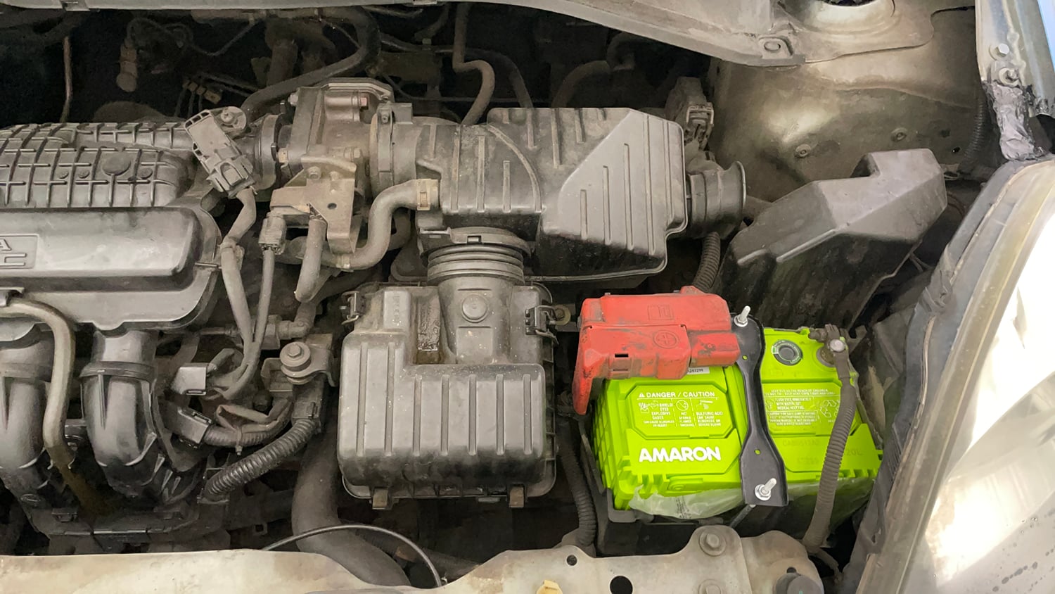 Used 2014 Honda Amaze 1.2 VX i-VTEC Petrol Manual engine ENGINE LEFT SIDE VIEW