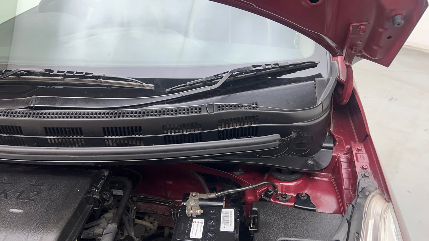 Used 2013 Hyundai Grand i10 Sportz 1.2 Kappa VTVT Petrol Manual engine ENGINE LEFT SIDE HINGE & APRON VIEW