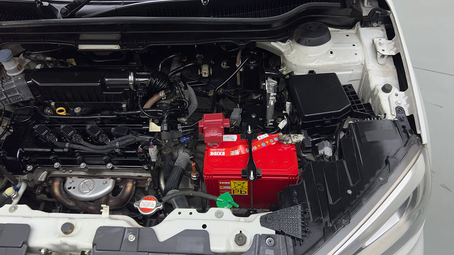 Used 2021 Maruti Suzuki Vitara Brezza ZXi AT SHVS Petrol Automatic engine ENGINE LEFT SIDE VIEW