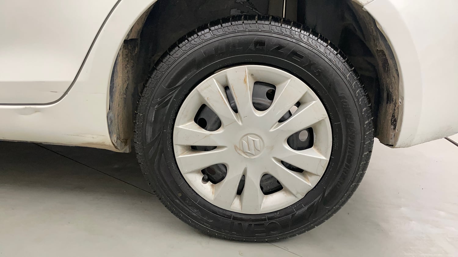 Used 2013 Maruti Suzuki Swift Dzire VXI Petrol Manual tyres LEFT REAR TYRE RIM VIEW