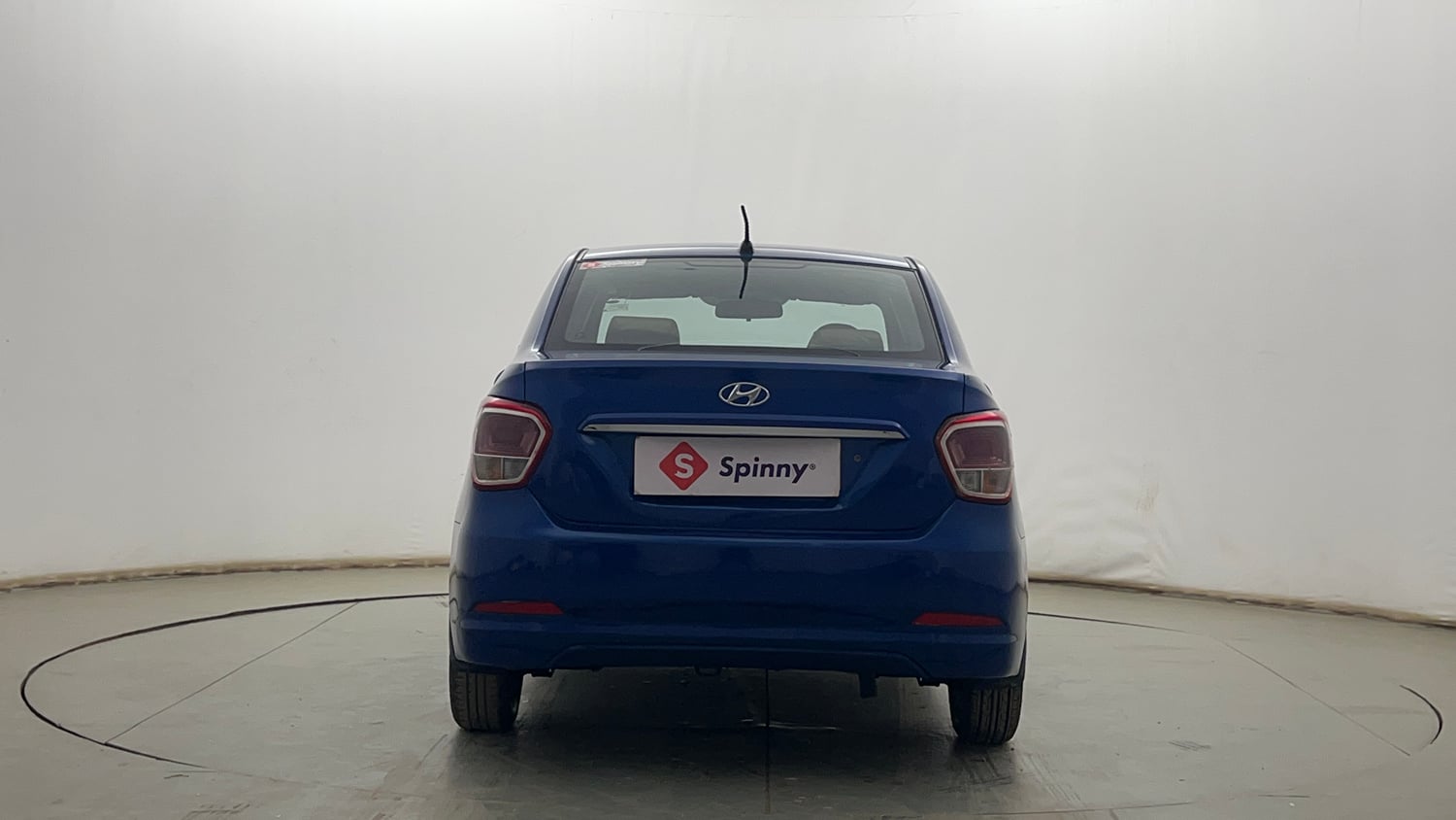 Used 2015 Hyundai Xcent Base 1.2 Petrol Manual exterior BACK VIEW