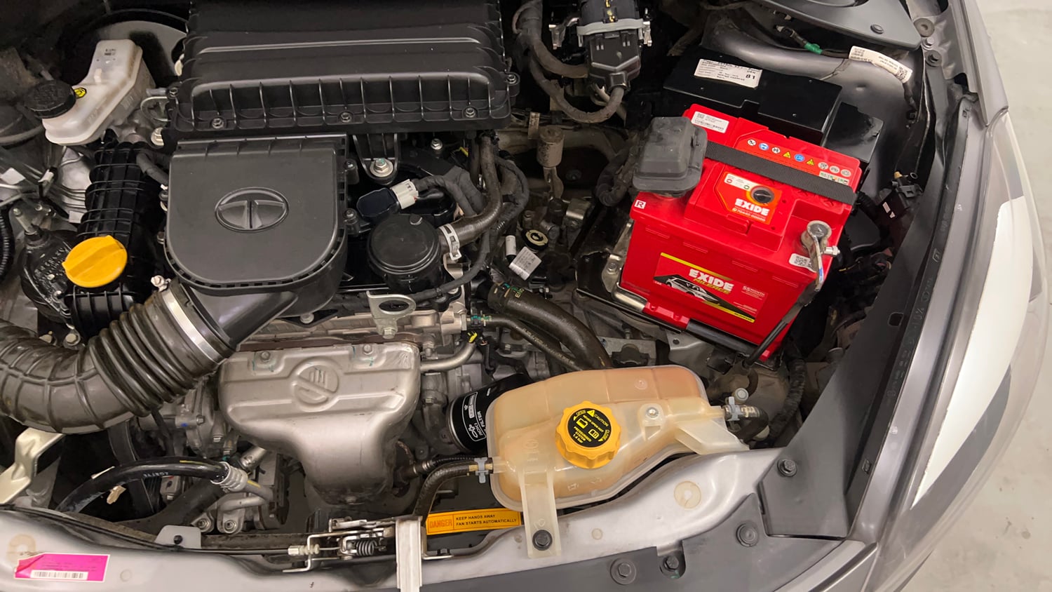 Used 2019 Tata Tiago Revotron XZ Plus Dual Tone Petrol Manual engine ENGINE LEFT SIDE VIEW