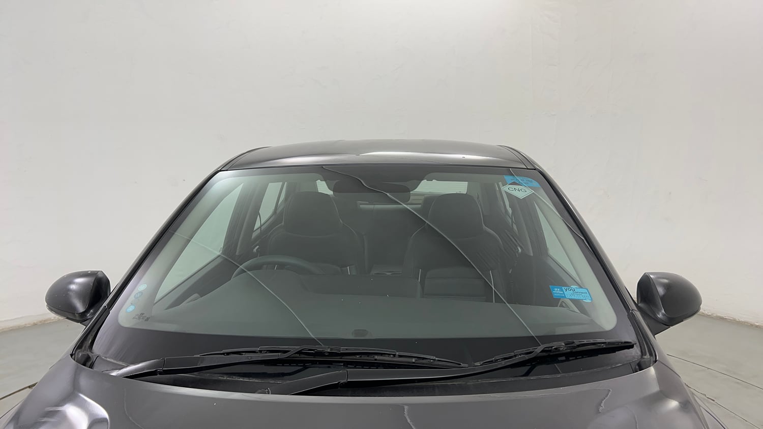 Used 2023 Hyundai Aura SX 1.2 CNG Cng Manual exterior FRONT WINDSHIELD VIEW