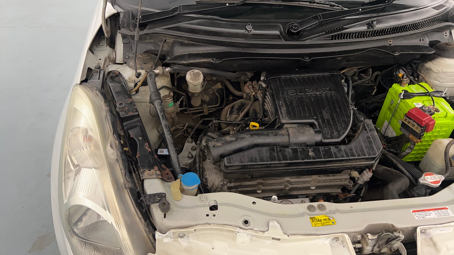 Used 2012 Maruti Suzuki Swift LXI CNG (Outside Fitted) Cng Manual engine ENGINE RIGHT SIDE VIEW