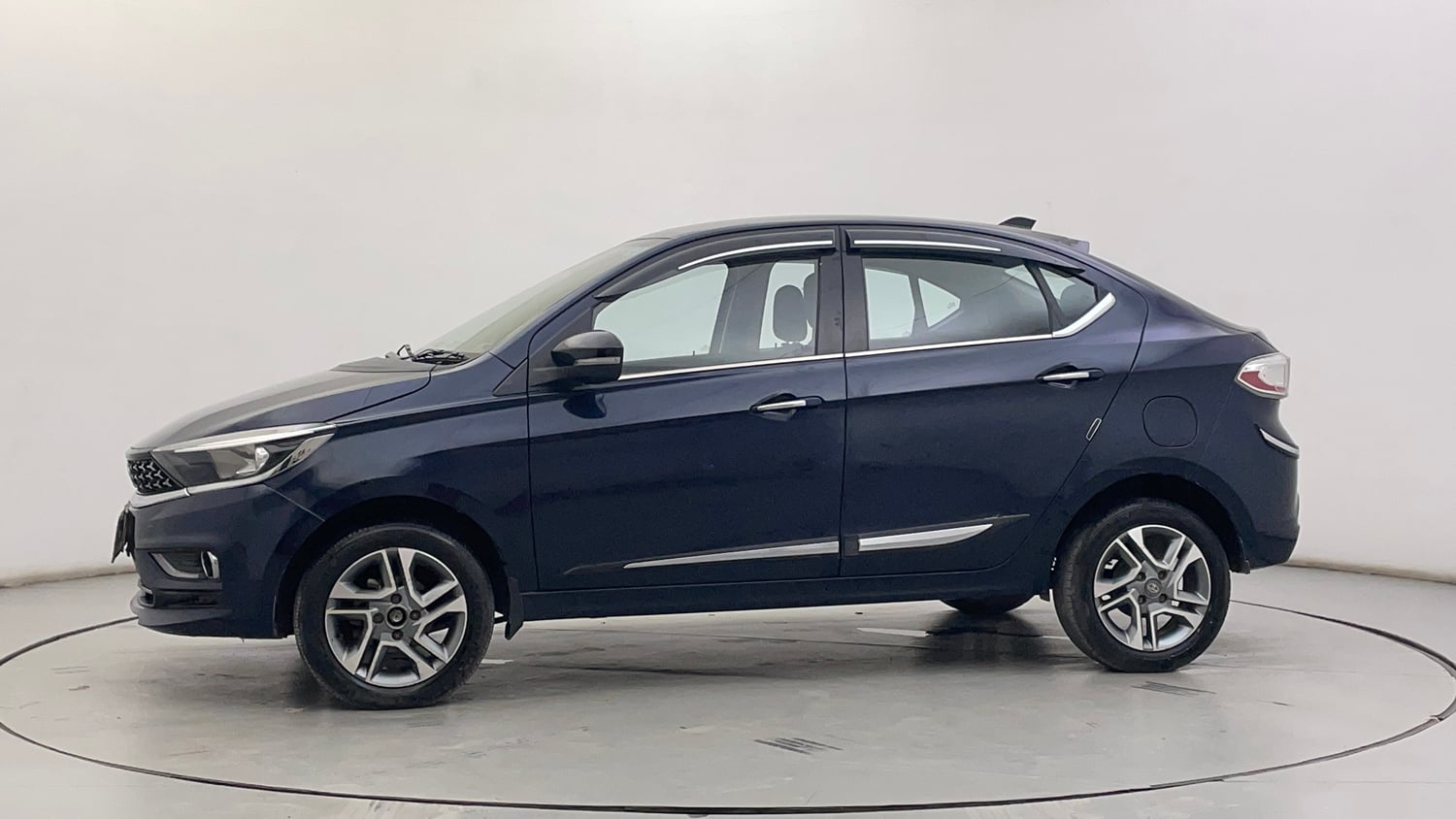 Used 2022 Tata Tigor XZ Plus Petrol Manual exterior LEFT SIDE VIEW
