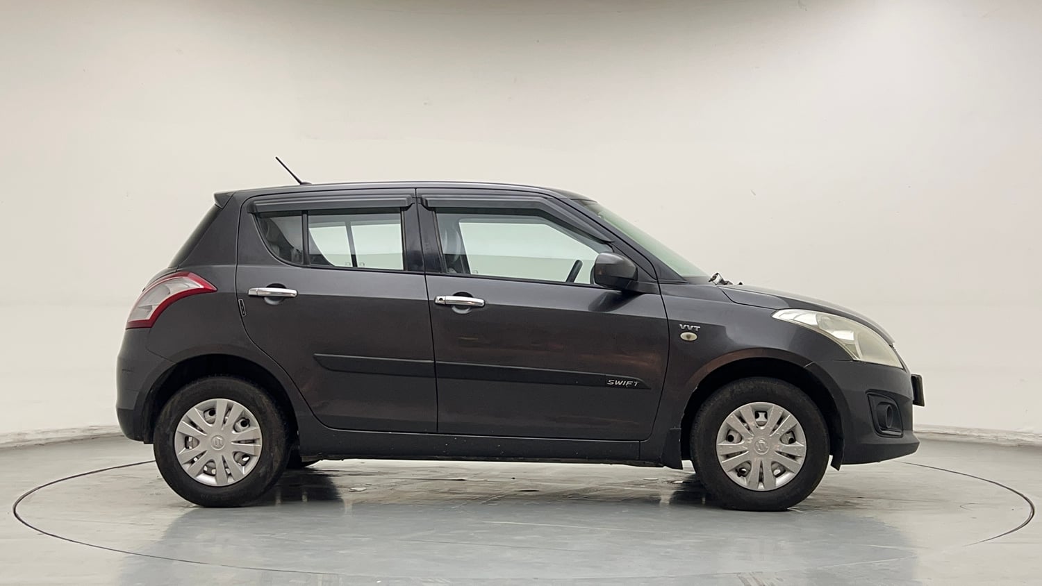 Used 2017 Maruti Suzuki Swift Lxi (O) Petrol Manual exterior RIGHT SIDE VIEW