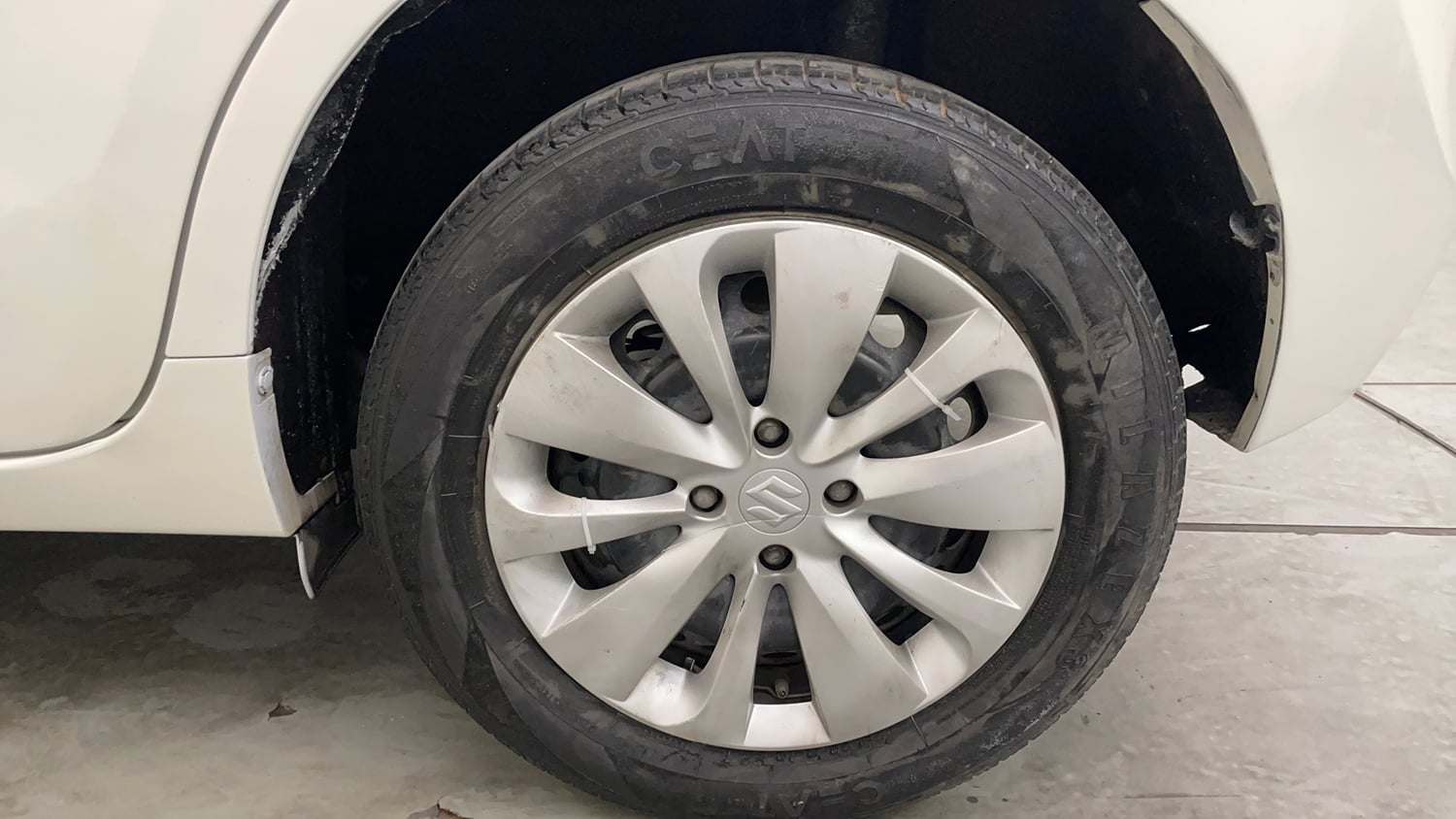 Used 2017 Maruti Suzuki Baleno Delta 1.2 Petrol Manual tyres LEFT REAR TYRE RIM VIEW