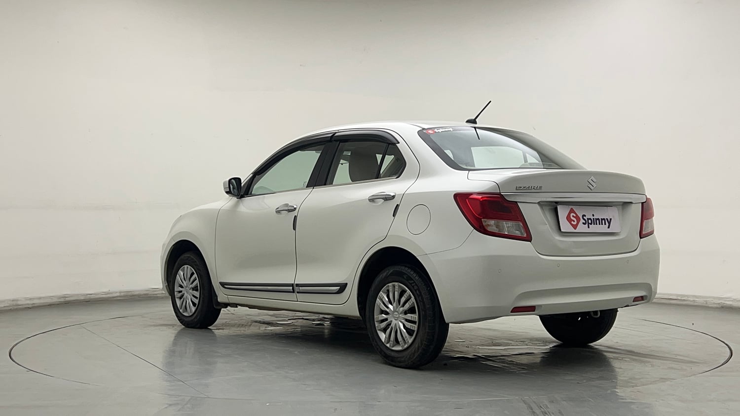 Used 2023 Maruti Suzuki Dzire VXi Petrol Manual exterior LEFT REAR CORNER VIEW