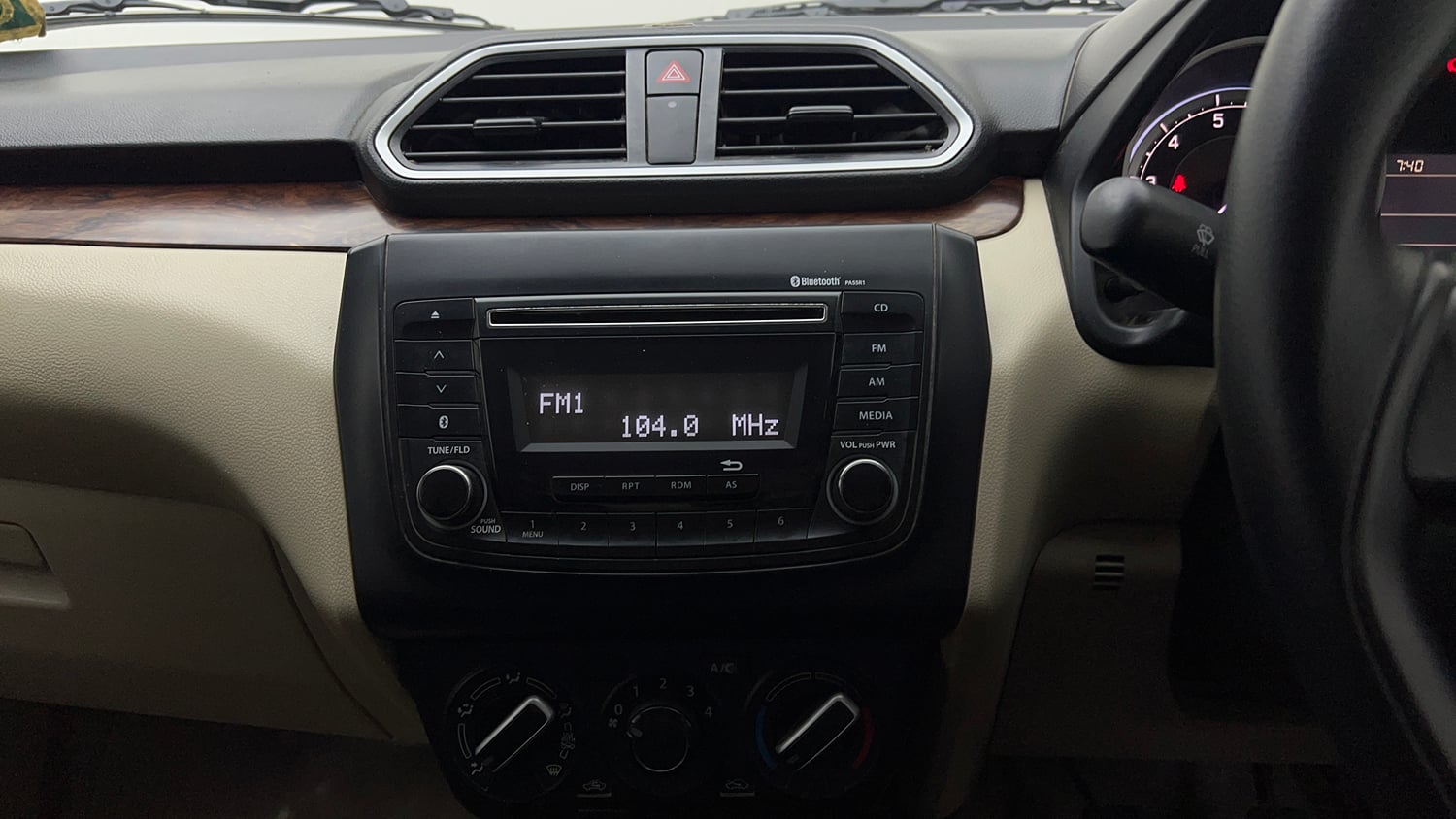 Used 2019 Maruti Suzuki Dzire VXi Petrol Manual top_features Integrated (in-dash) music system