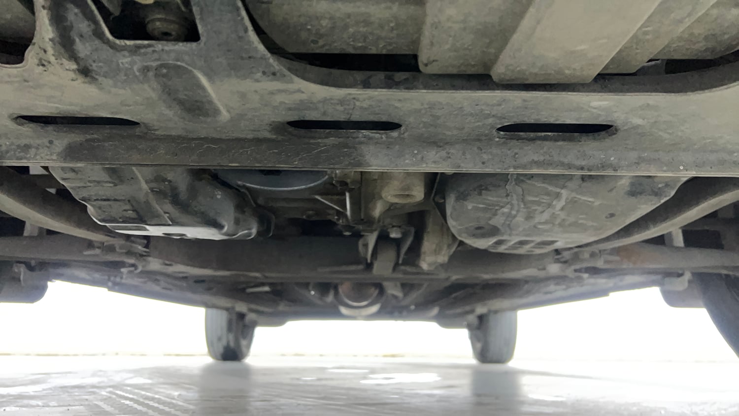 Used 2024 Nissan Magnite XV Premium Turbo CVT Dual Tone Petrol Automatic extra FRONT LEFT UNDERBODY VIEW