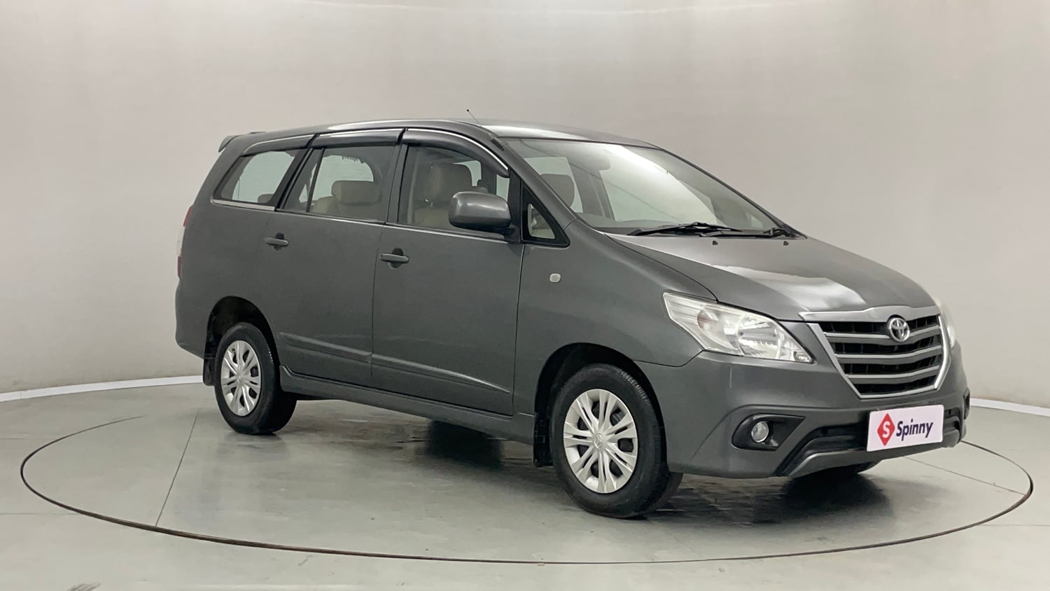 Used 2013 Toyota Innova 2.5 GX 8 STR BS-III Diesel Manual exterior RIGHT FRONT CORNER VIEW