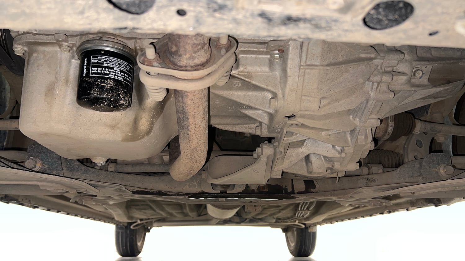 Used 2024 Maruti Suzuki Ignis Zeta 1.2 AMT Petrol Automatic extra FRONT LEFT UNDERBODY VIEW