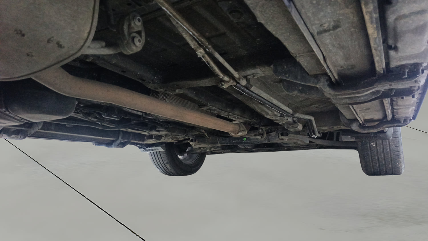 Used 2022 Mahindra XUV700 AX 7 Petrol AT 7 STR Petrol Automatic extra REAR RIGHT UNDERBODY VIEW