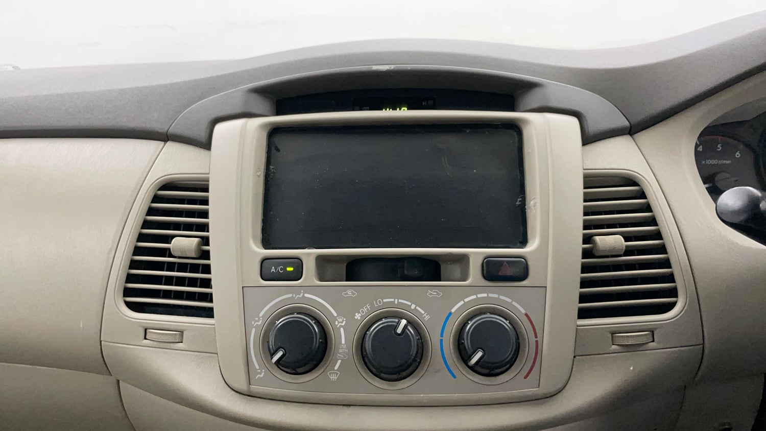 Used 2013 Toyota Innova 2.5 GX 8 STR BS-III Diesel Manual interior MUSIC SYSTEM & AC CONTROL VIEW